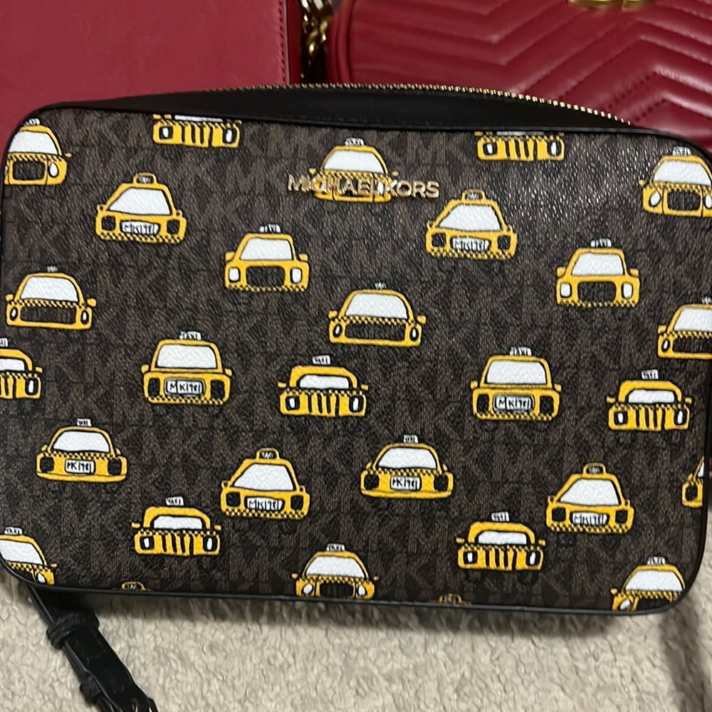 Micheal Kors taxi cross body bag